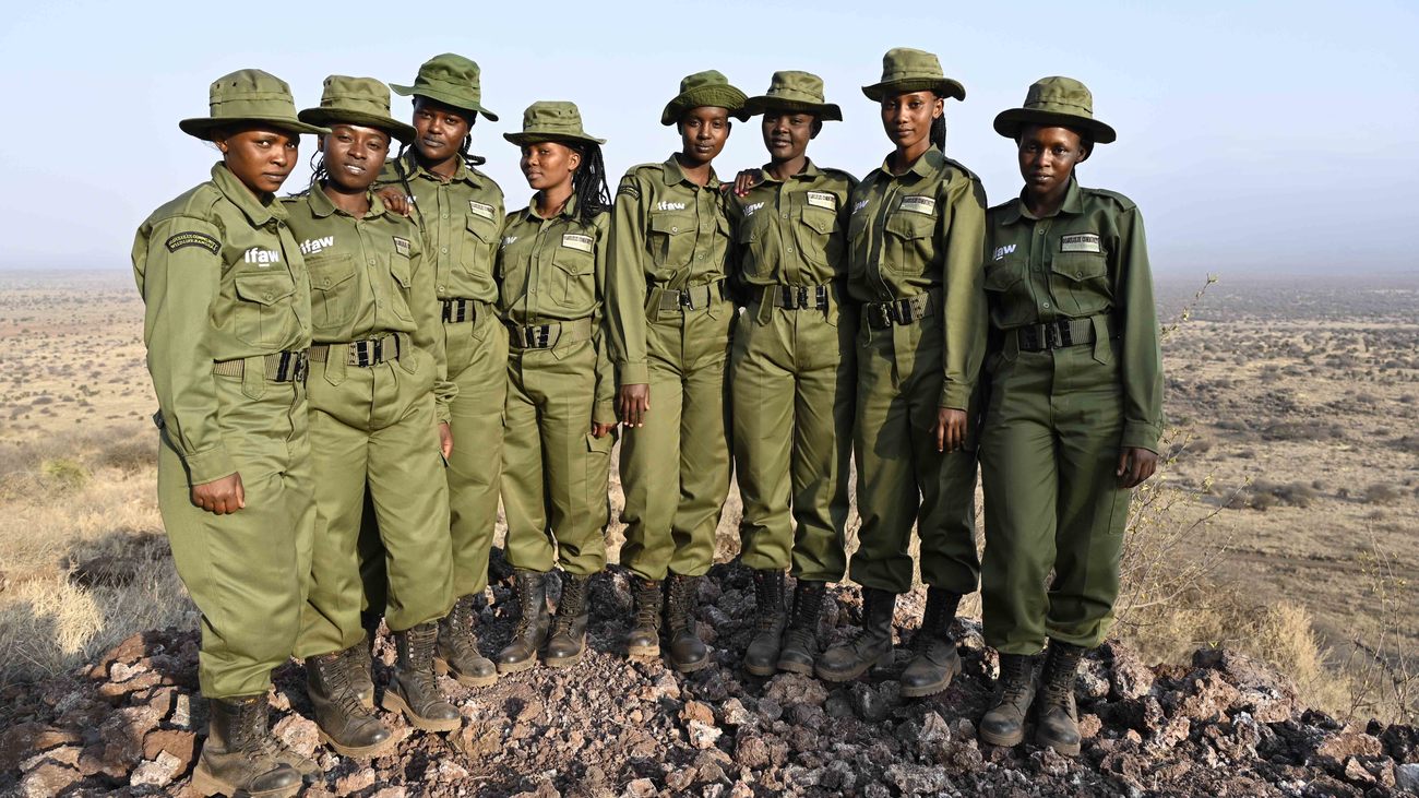 eight women rangers stand together for a team photo