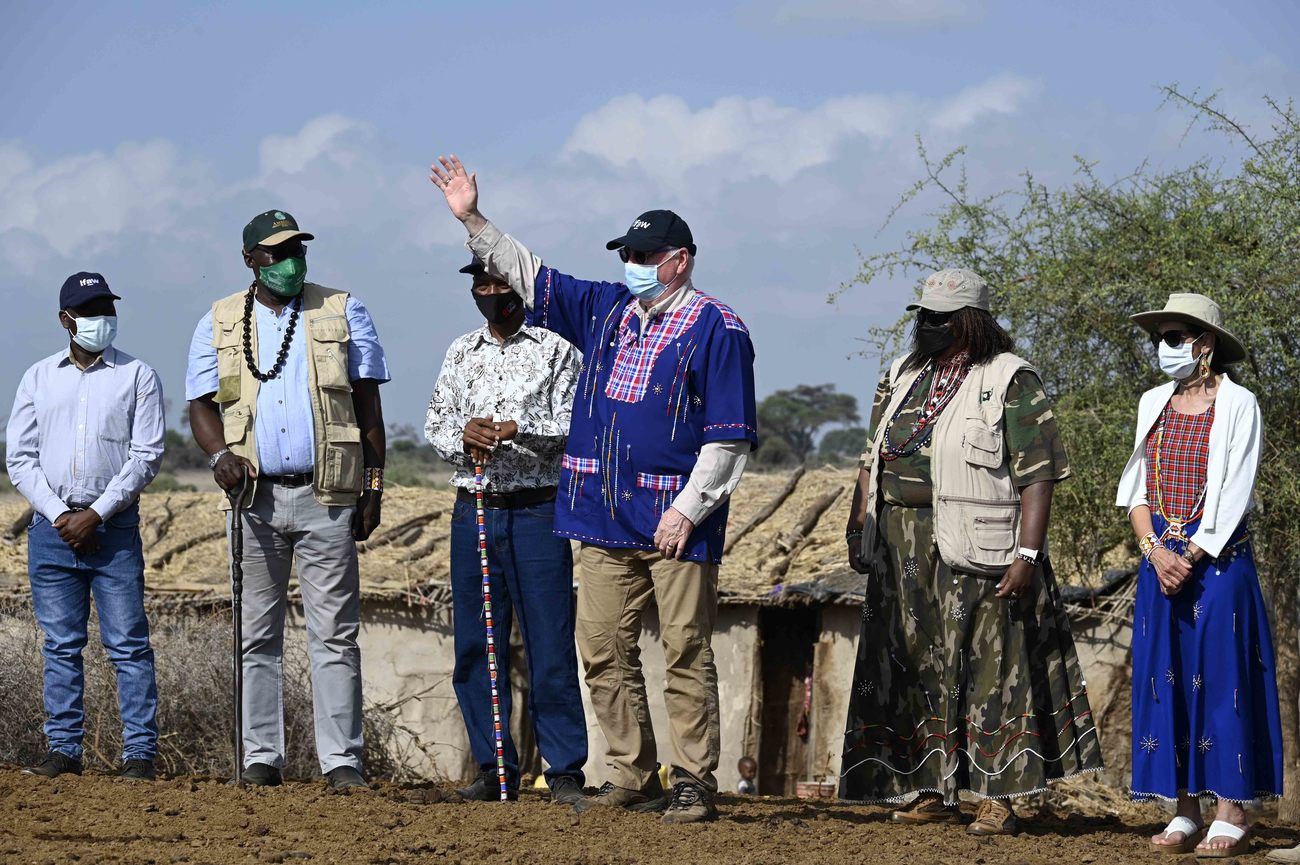 IFAW President and CEO Azzedine Downes waves as he meets with local leaders in Amboseli, Kenya.