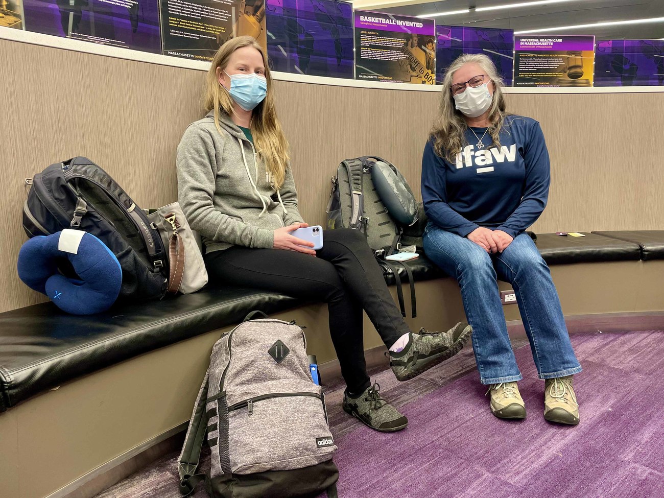 Two members of IFAW's disaster response team at the airport en route to Poland to help animals impacted by the Ukraine crisis. 