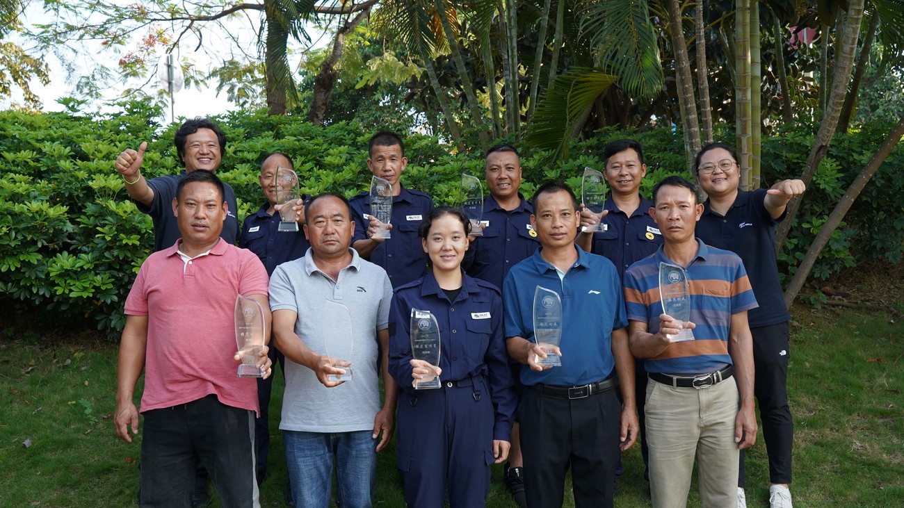 group photo of rangers holding awards