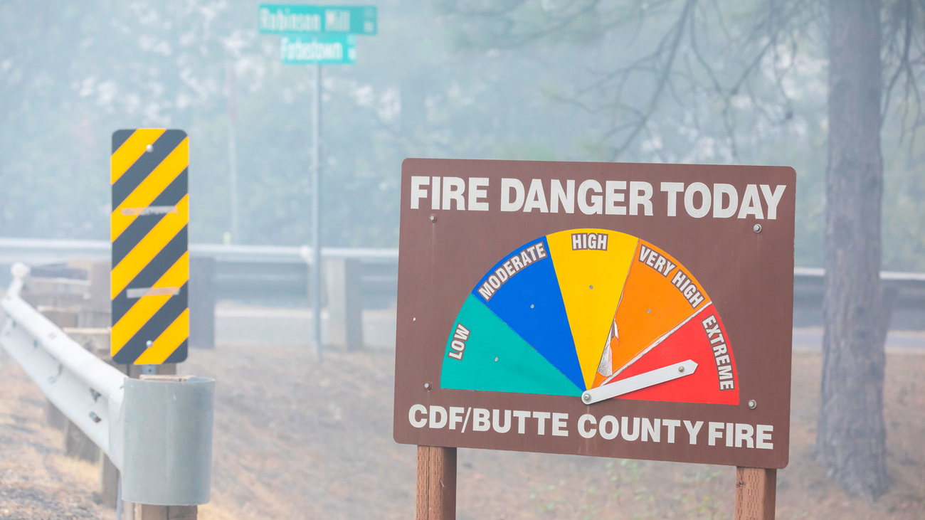 A sign in Butte County, California, indicates the likelihood of fire danger in the area is extreme.