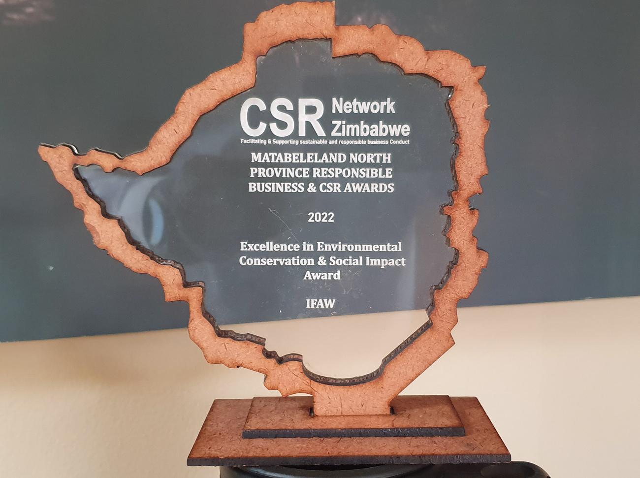 The International Fund for Animal Welfare (IFAW) has been honored with Zimbabwe’s prestigious Excellence in Environmental Conservation and Social Impact Award. The award was presented at the 2022 edition of the annual Matebeleland North Province Environment Responsible Business and CSR Awards dinner event held in Victoria Falls, Zimbabwe’s tourism capital, on 23 September 2022.   The accolade, in recognition of IFAW and ZimParks' efforts in addressing key conservation challenges around Hwange-Matetsi-Zambezi landscape, is also testament to the positive impact of various interventions aimed at enhancing the livelihoods of communities co-existing with wildlife. Since the signing of the conservation agreement in 2019, IFAW has injected over US$3 million towards infrastructure development, ranger training, tools and equipment, game water supply, capacitation of the Veterinary Unit, operational support and community engagement.  Hosted annually by the Corporate Social Responsibility Network Zimbabwe, the awards acknowledge CSR and sustainability efforts and contributions made by individuals, the private and public sectors towards community development in Zimbabwe. 