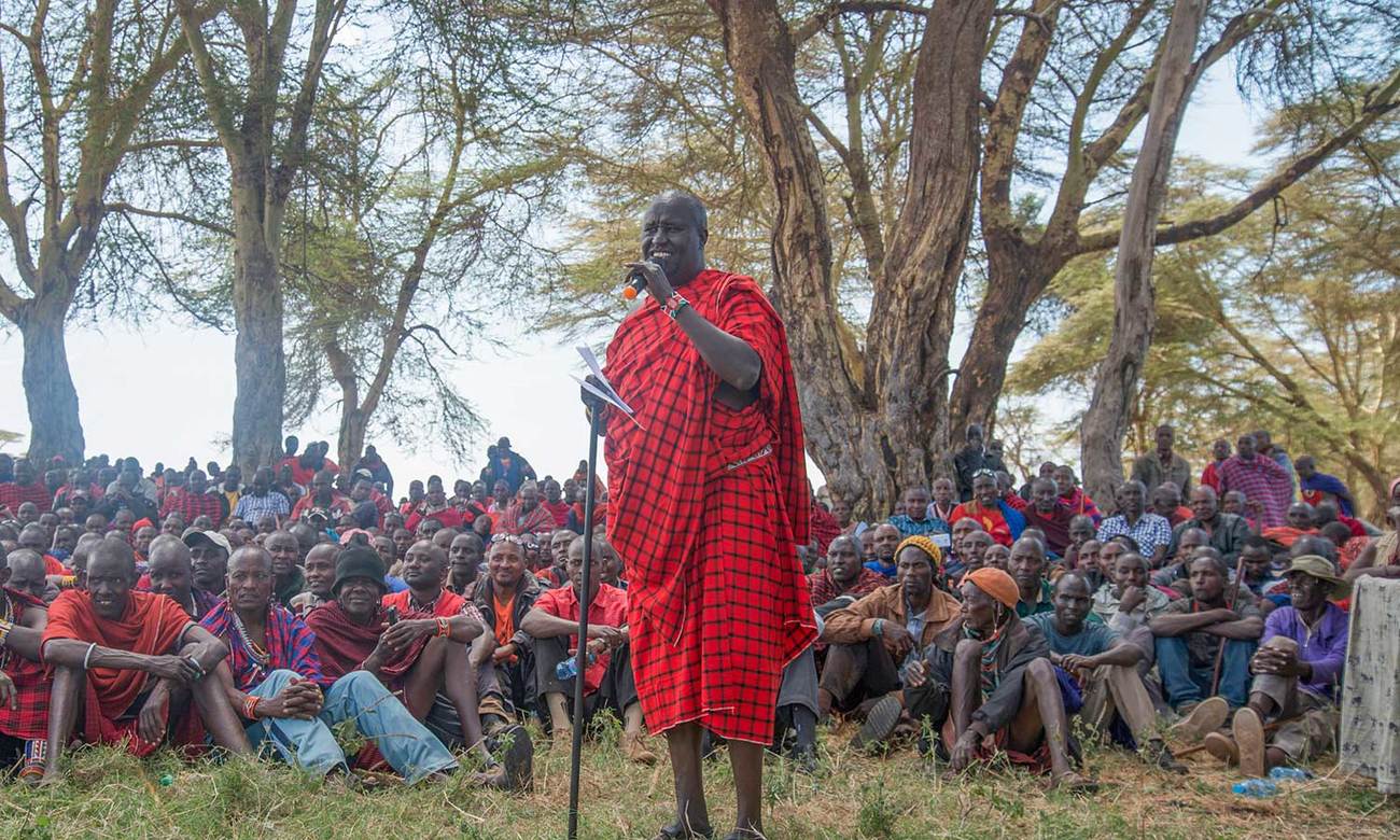 Daniel Leturesh, the chairman of the Olgulului Ololarashi Group Ranch, speaks at a meeting.