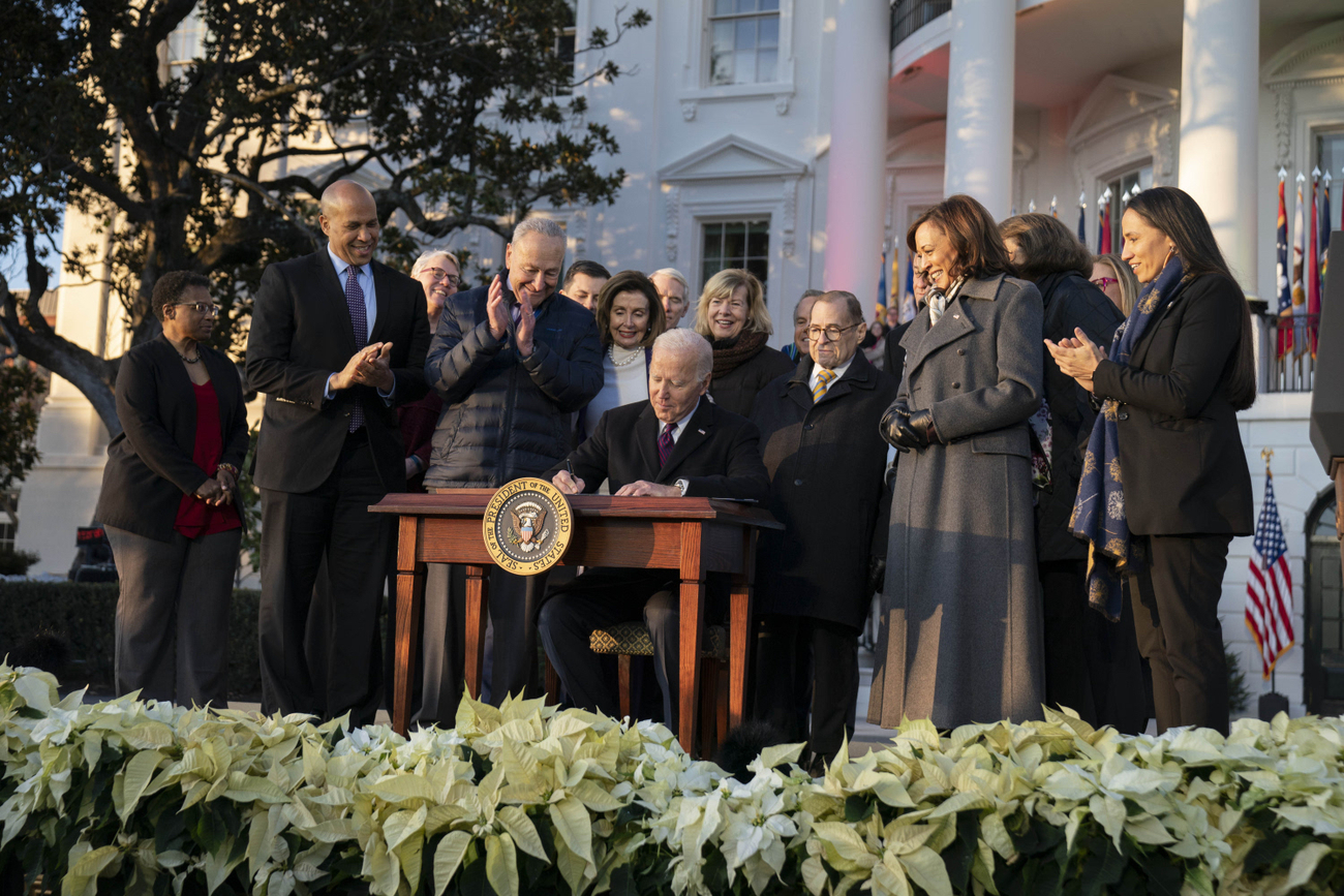 President Biden signs a bill into law.