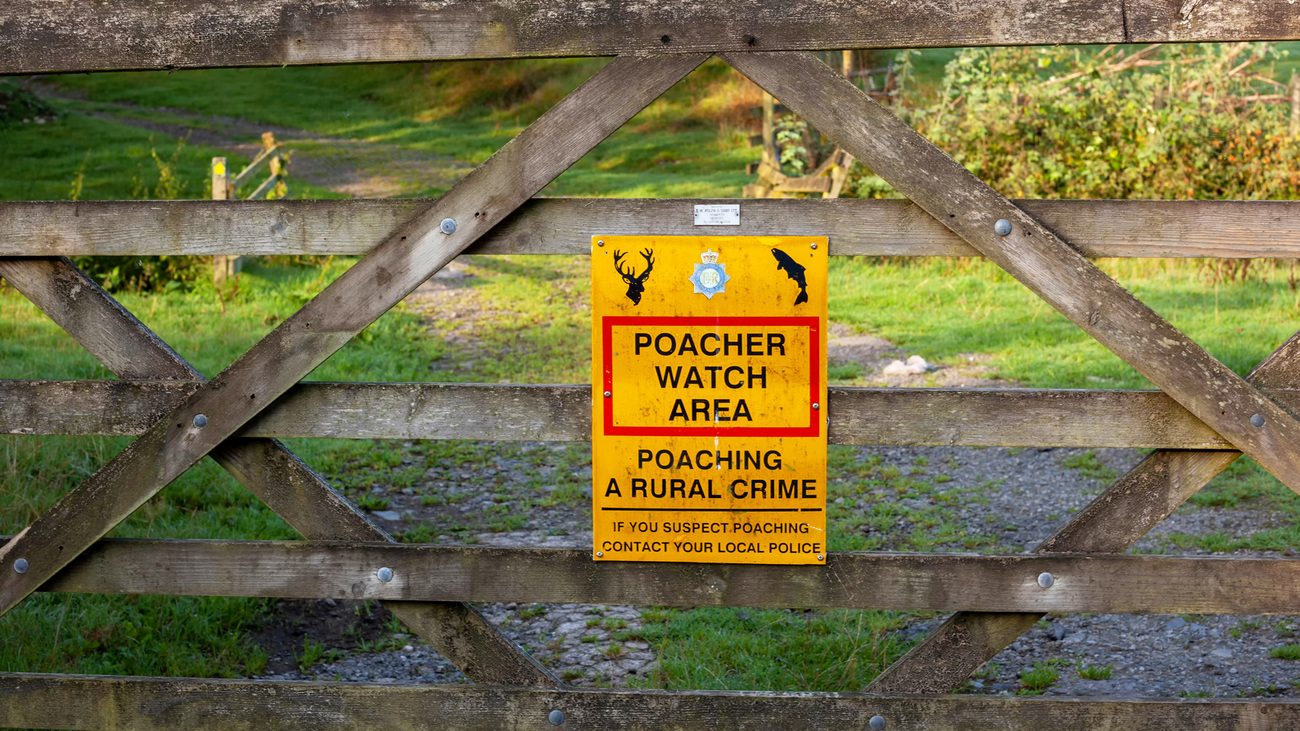 Poacher Watch Area sign in the British countryside.