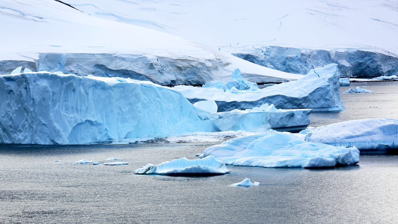 Parts of a glacier break off into the water in Antarctica.