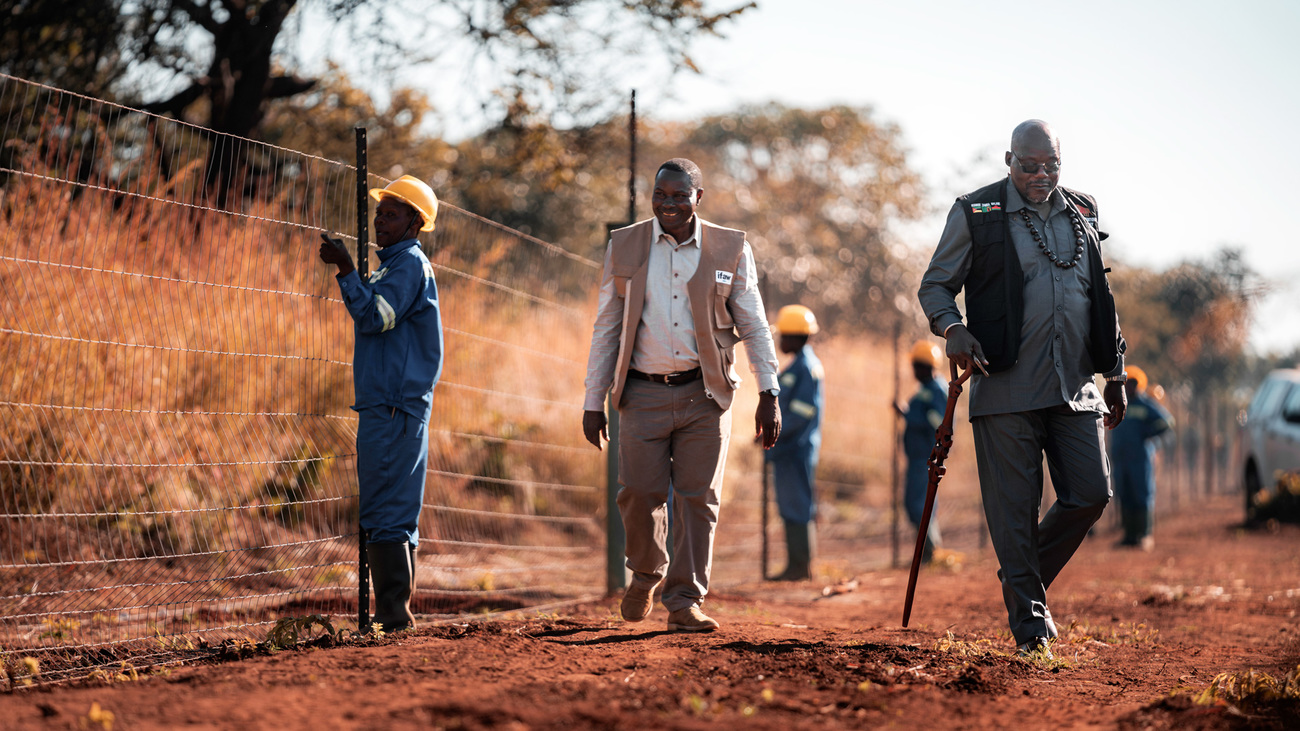 Community fence construction in Malawi.