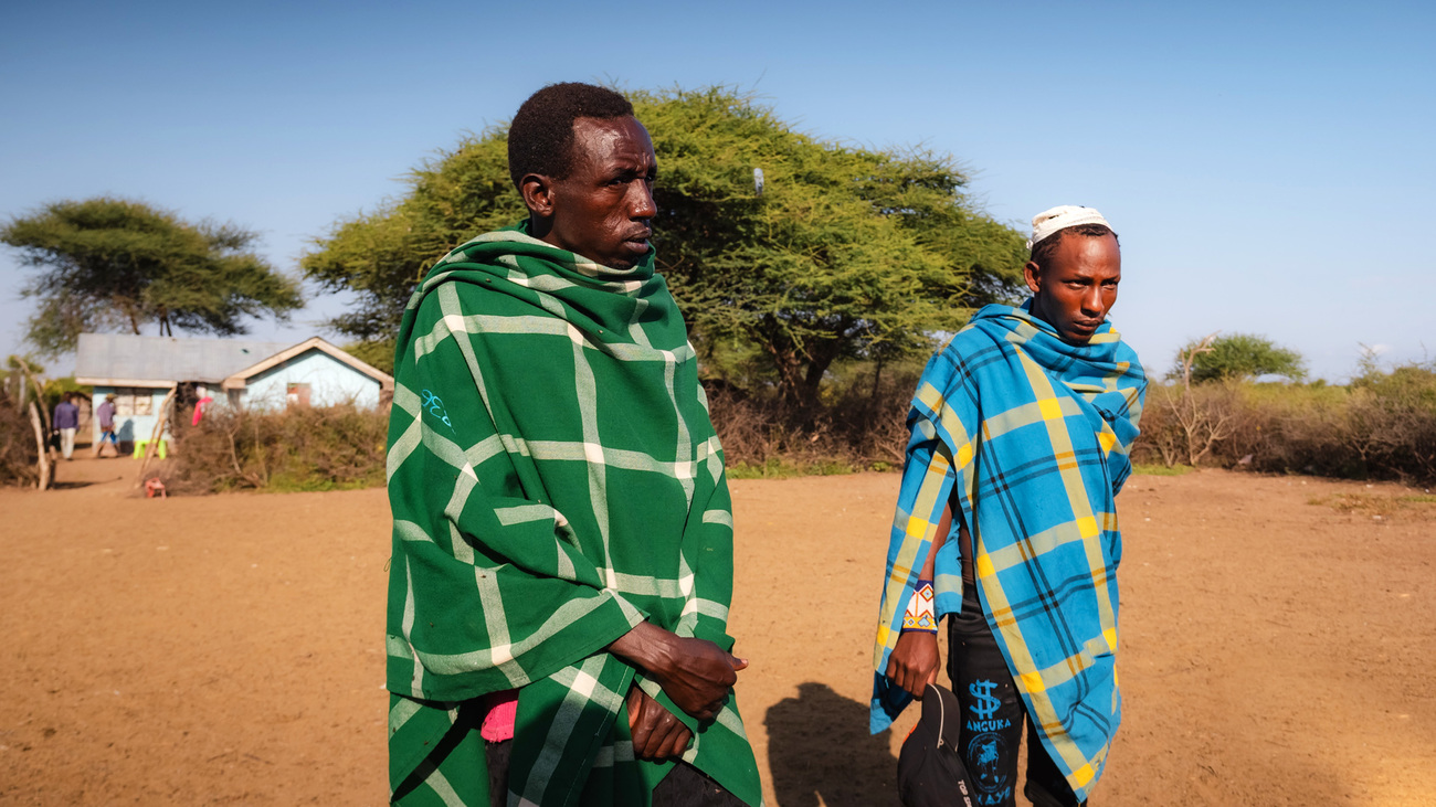 Members of a Maasai community gather at their boma near the Olgulului-Ololorashi conservancy in Kenya.