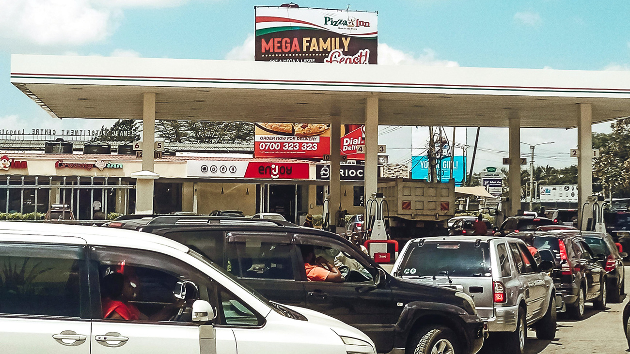 Cars queue for fuel at a gas station in Nairobi, Kenya.