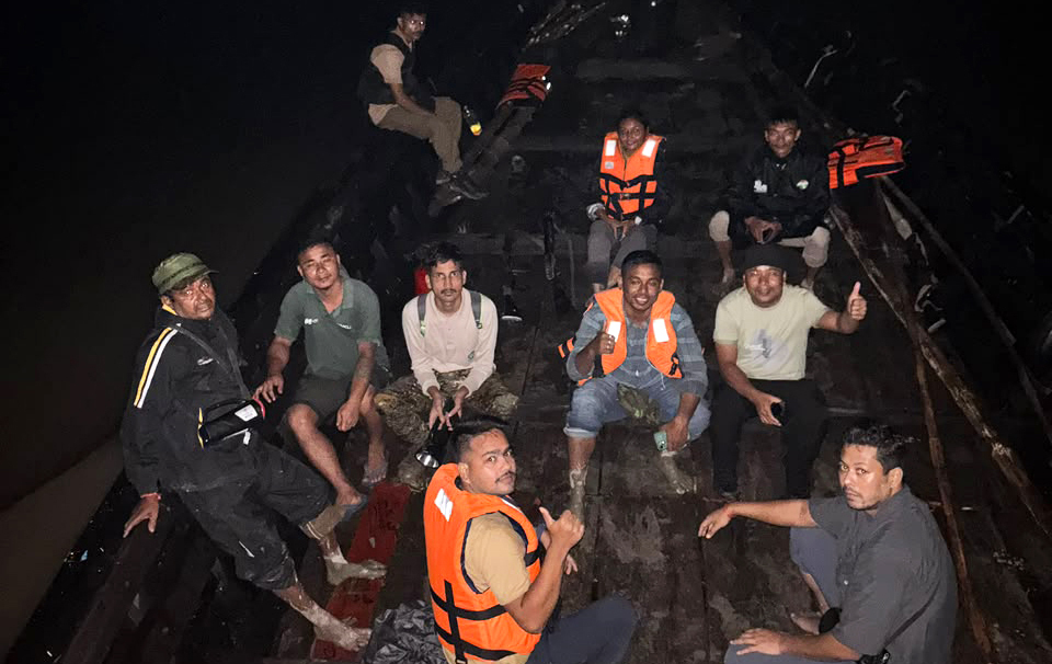 Members of the rescue team and local partners who helped give the young tiger cub a chance to return to the wild.