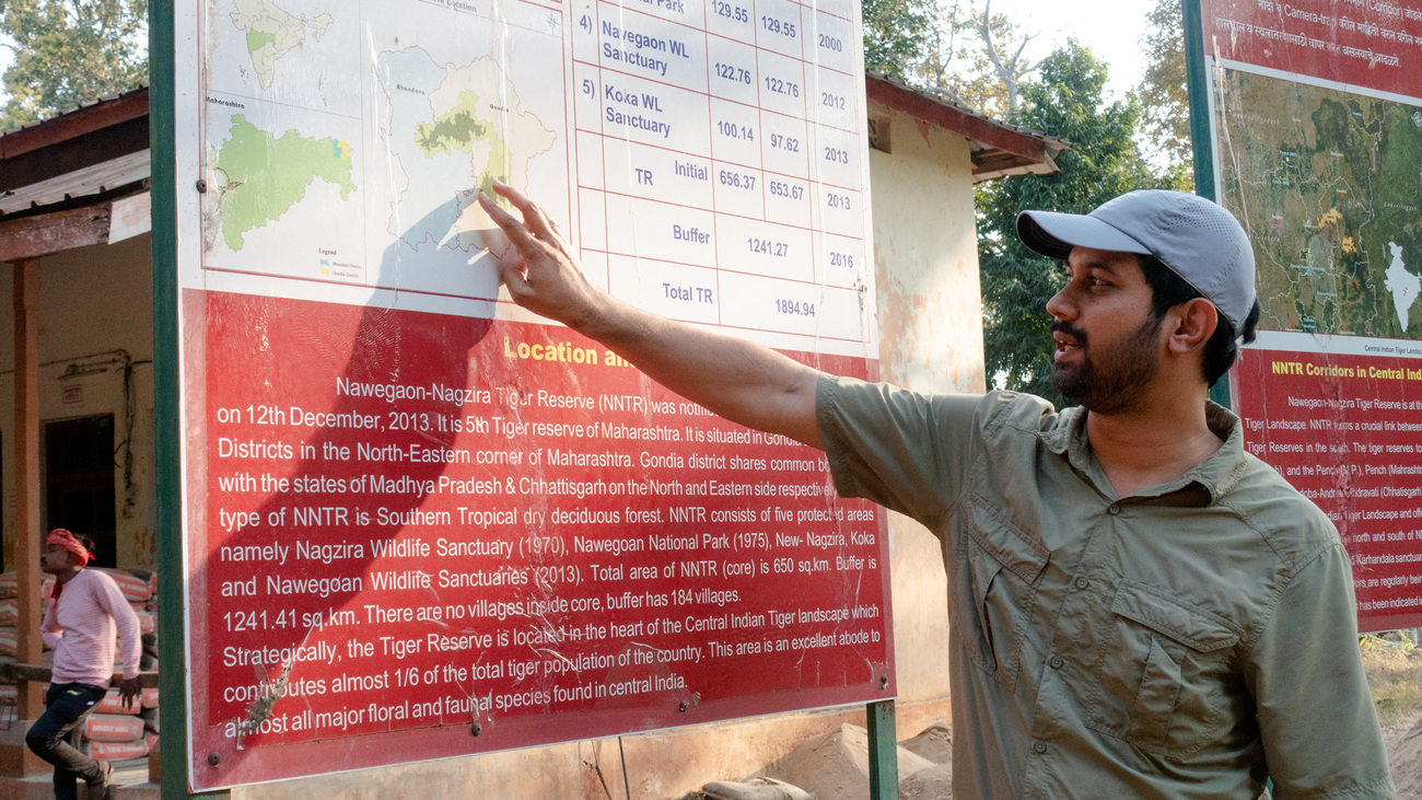 Ankit Thakur, Project Head of WTI’s Central India Tiger Corridor Project, uses a map to illustrate the tiger landscapes and critical connections that enable wildlife to move between protected areas in Central India.